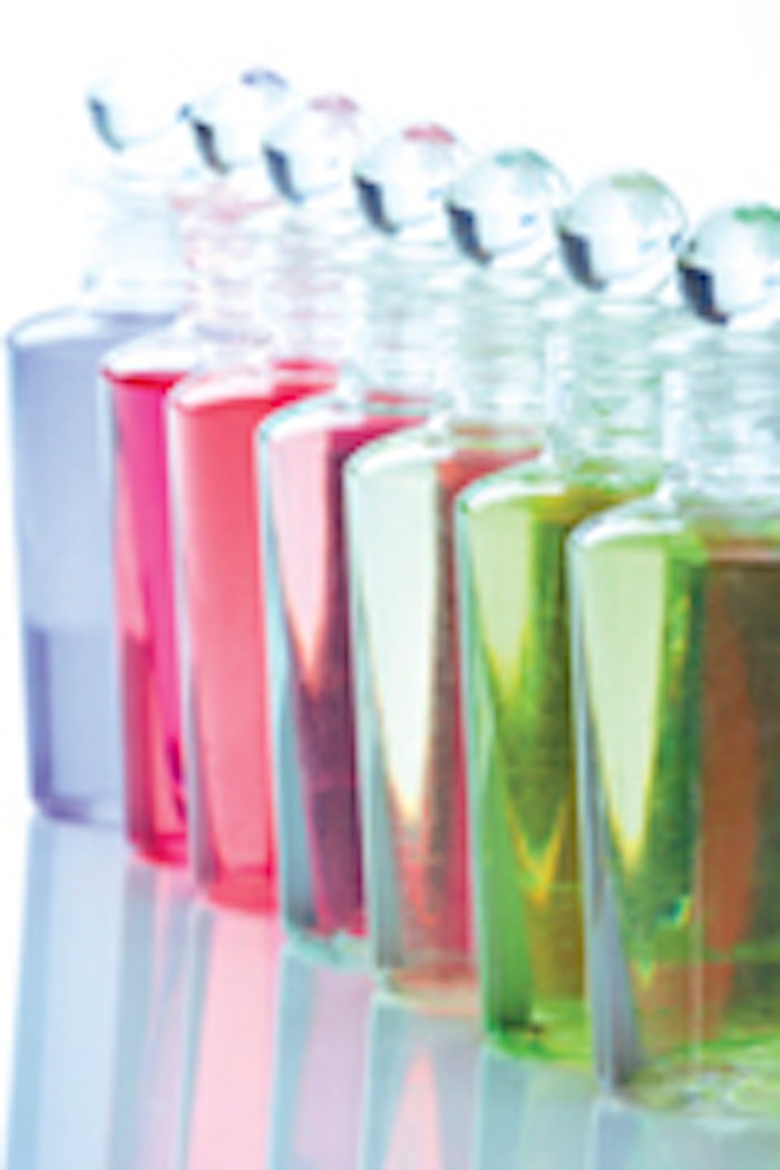 Spa bottles - multi colors - on reflective surface