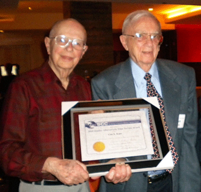 (from L): Stanley Allured poses with Gus Kass as he received the Stanley Allured Lifetime Service Award, presented to him by the Midwest SCC in 2011.