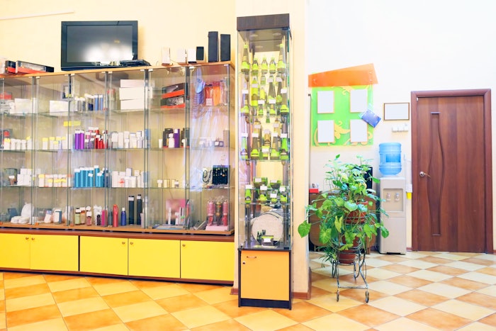 Beauty salon showcase with colorful bottles