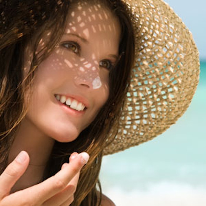 Woman-hat-sunscreen-on-nose-300