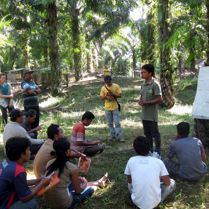 A trainer with his group in West Kalimantan.