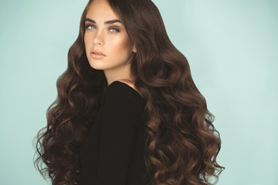 Studio shot of young beautiful woman