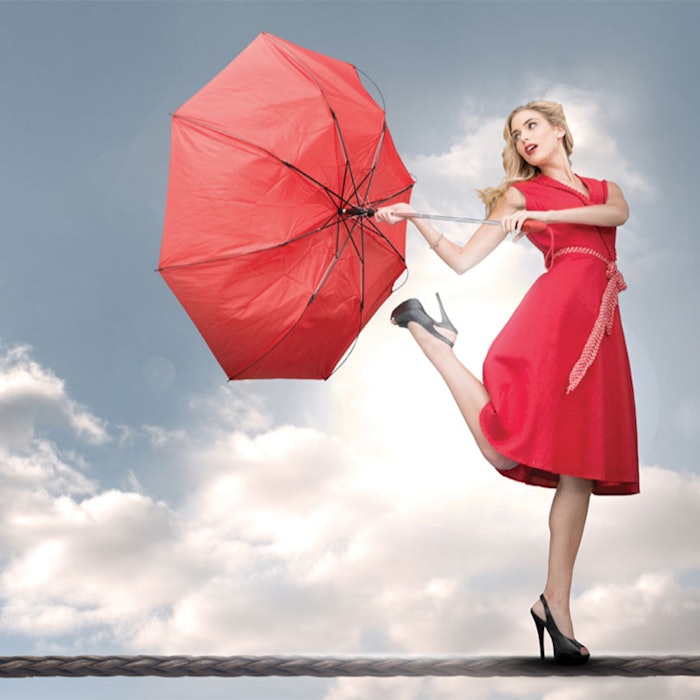 WomanBalancingUmbrella850