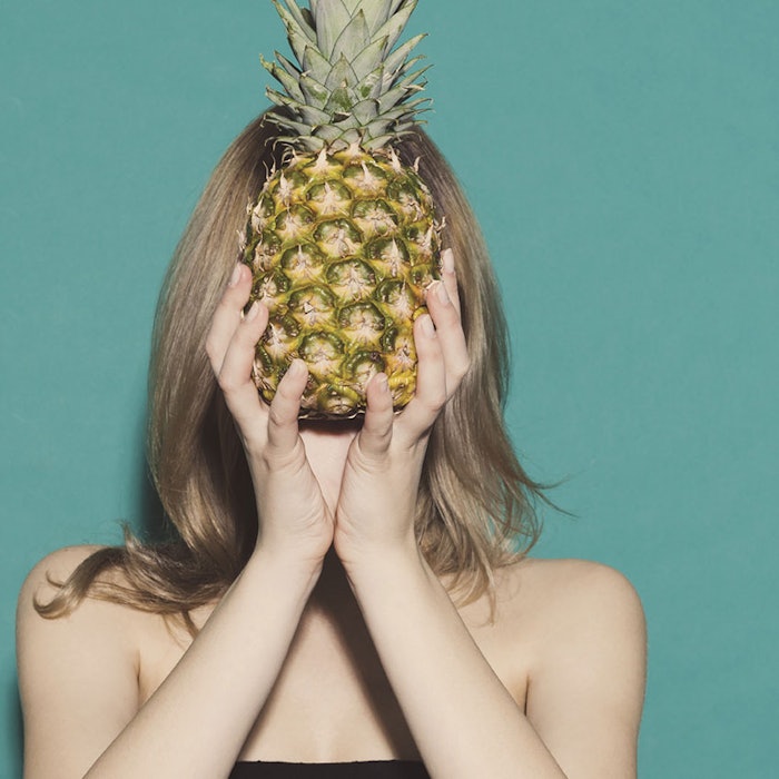 Bromelain and papain are food enzymes found respectively in pineapple and papaya, and often used as cosmetic ingredients.