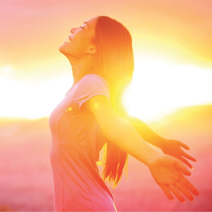WomanCelebratingSun850