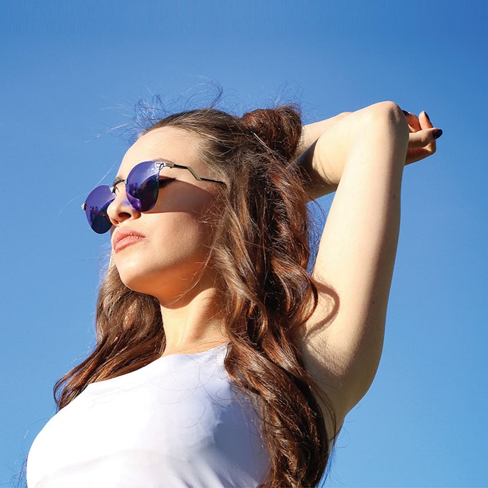 WomanStretchingBlueLight850