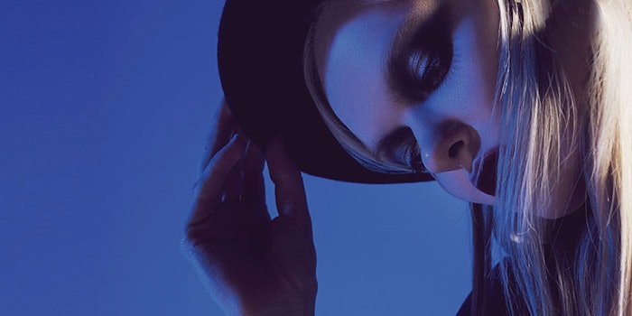 BlueLitWomaninHat850x425
