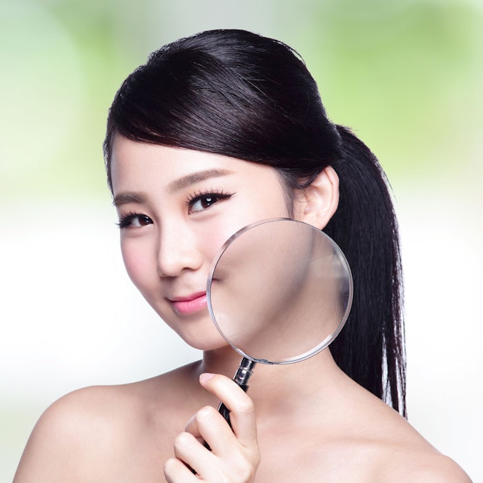 AsianWomanMagnifyBeauty850