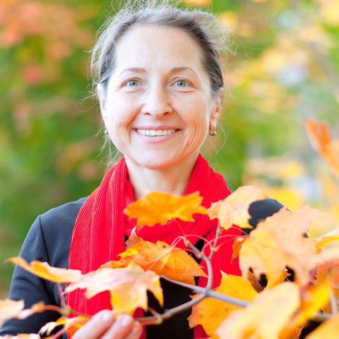 Mature Woman Maple Leaves