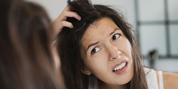 WomanFrustratedHairScalp850x425