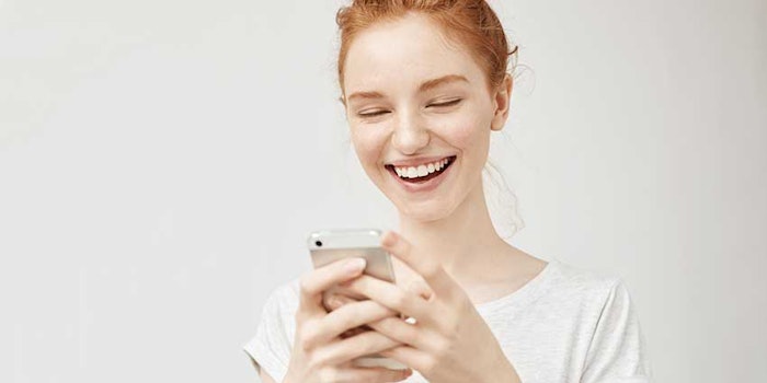 smilingatphone_425