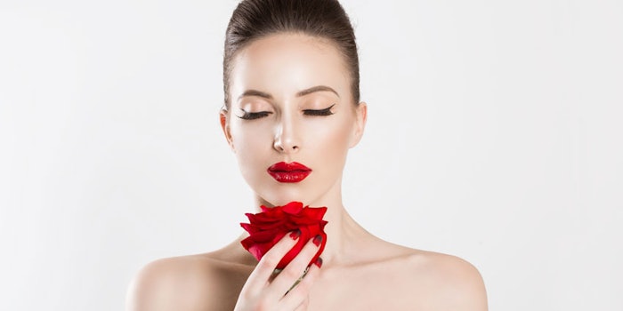 WomanSmellingRose850x425