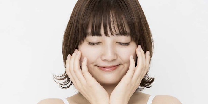 AsianWomanPattingHerFace850x425