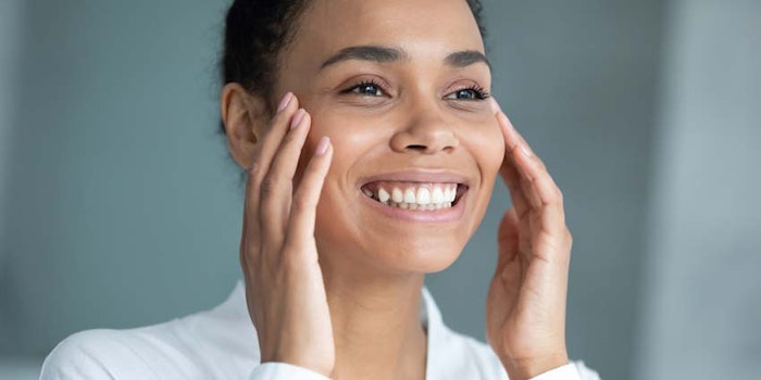 WomanPattingHerCheeksSmiling850x425