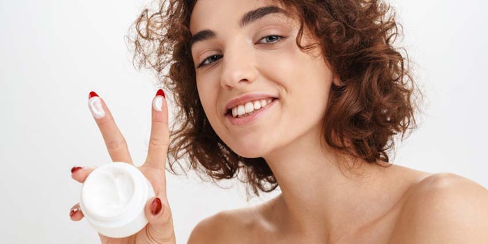 YoungWomanHoldingFaceCreamPeace850x425