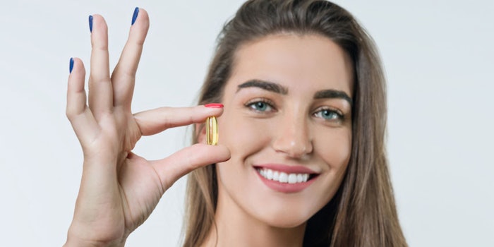 WomanHoldingPillSupplementHealthConcept_850x425