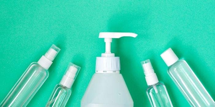 BottlesClearSanitizerSpraysGreenBackground_850x425