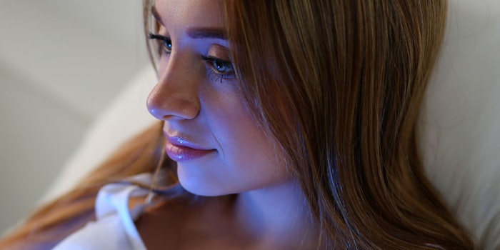 WomanRestingBlueLightDeviceGlow_850x425
