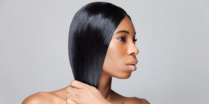 AfricanBlackEthnicWomanHoldingSmoothedHairSerious_850x425