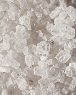 A simple example is NaCl (sodium chloride, shown left). Sodium chloride is commonly known as salt or table salt. It has the chemical formula NaCl, representing a 1:1 ratio of sodium and chloride ions.