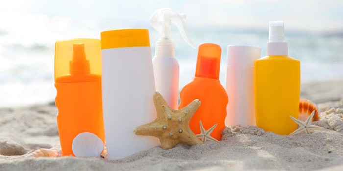 SunscreenBottlesLinedUpOnBeach_850x425