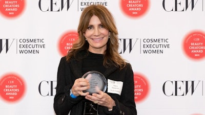 Tiffany Masterson, founder and CCO of Drunk Elephant, poses with the Anti-aging award.