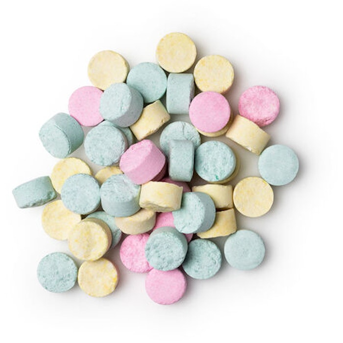 Lush Toothpaste Tabs create a paste when crushed between teeth that can then be used to cleanse the mouth with a wet toothbrush.