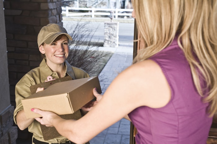 Mail courier delivering a package