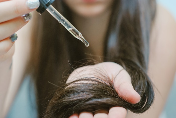 Study Correlates Oil Penetration into Hair with Tensile Strength