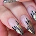 Spiderweb nail design created by @shape.with.teryn