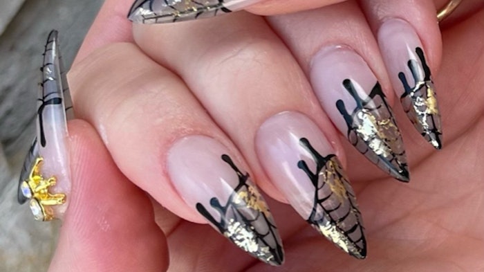 Spiderweb nail design created by @shape.with.teryn