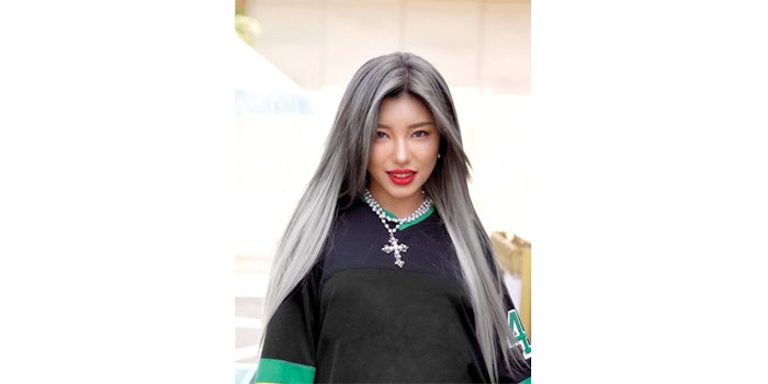 Model after using Celeb Luxury's Viral Graphite shampoo and conditioner.