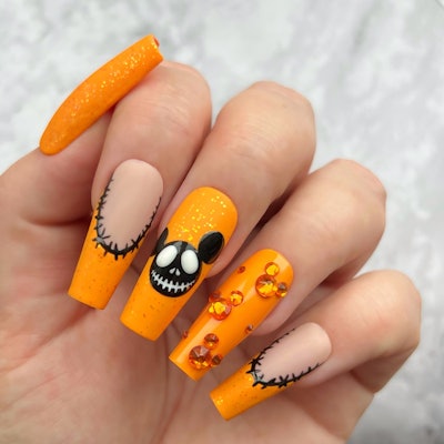 The finished nail set featuring, Mickey Mouse nail art inspired by Tim Burton's The Nightmare Before Christmas.