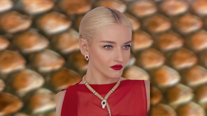 Get the how-to for Julia Garner's Critics' Choice Awards sleek hair look from hairstylist Bobby Eliot.