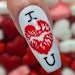 Learn how to create Valentine's Day nail art for your clients with this tutorial from Kelly Scothorn.