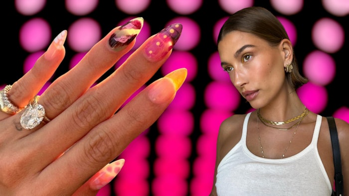 While she may be known for her minimalist nails, Hailey Bieber recently debuted a maximalist nail set that's perfect for festival season. Learn how to recreate this look for your clients with a tutorial.