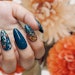 Learn how to create fall floral nail art from Ashley Biasella.