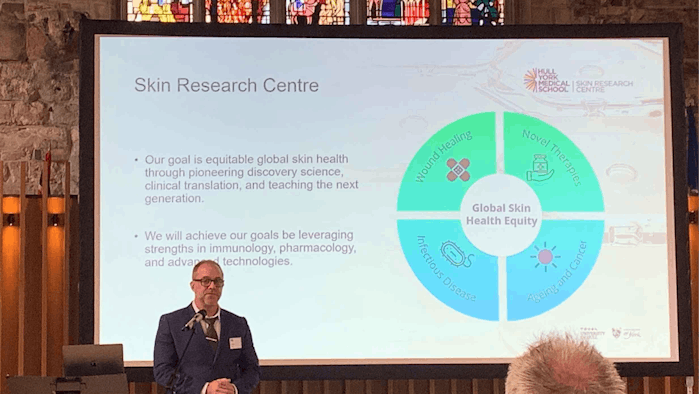 Prof. Tarl Prow, Ph.D., director of the center, introduced the work of the center, which will focus on improving patient care through scientific discovery.