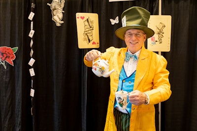 Get creative with your booth design! Here is Omega Ingredient's Steve Pearce in his Alice in Wonderland-inspired booth.