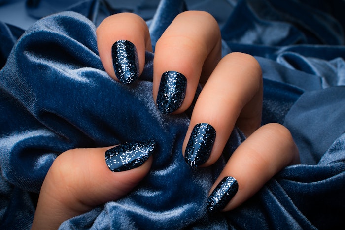 This season, it's all about the sparkle. See eight reflective glitter nail designs to inspire your shimmery nail looks this winter.
