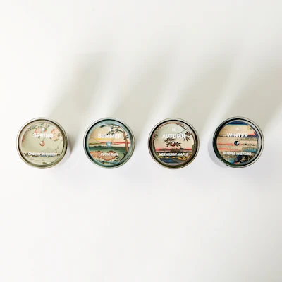 Joya x Brooklyn Museum’s multisensory partnership is designed “to evoke the seasons, settings, and spirit of Utagawa Hiroshige’s 100 Famous Views of Edo in vivid, meticulous detail.” Candles shown: Cherry Blossom (Spring), Plum Rain (Summer), Vermilion Maple (Autumn), and Purple Wisteria (Winter).