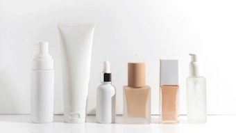 cosmetic product samples lined up on white background