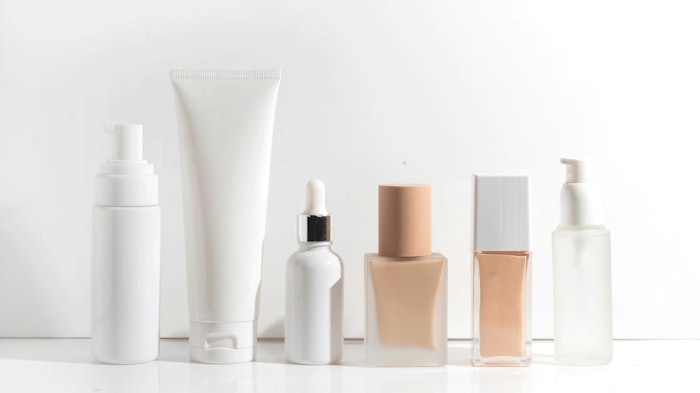 cosmetic product samples lined up on white background