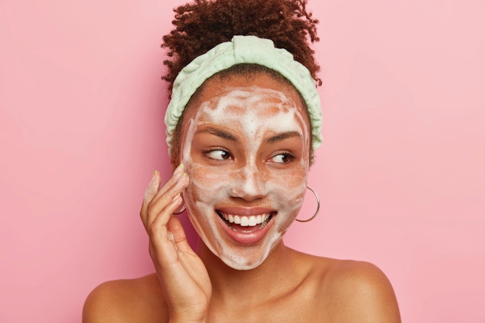 Teen client washing her face