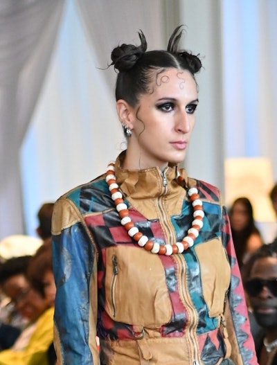 This look combines a playful, edgy style with a polished finish, perfect for making a statement.