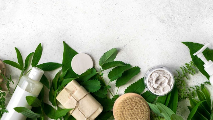 natural skin body care concepts splay laying with greenery