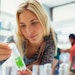 beauty consumer reading skin care product