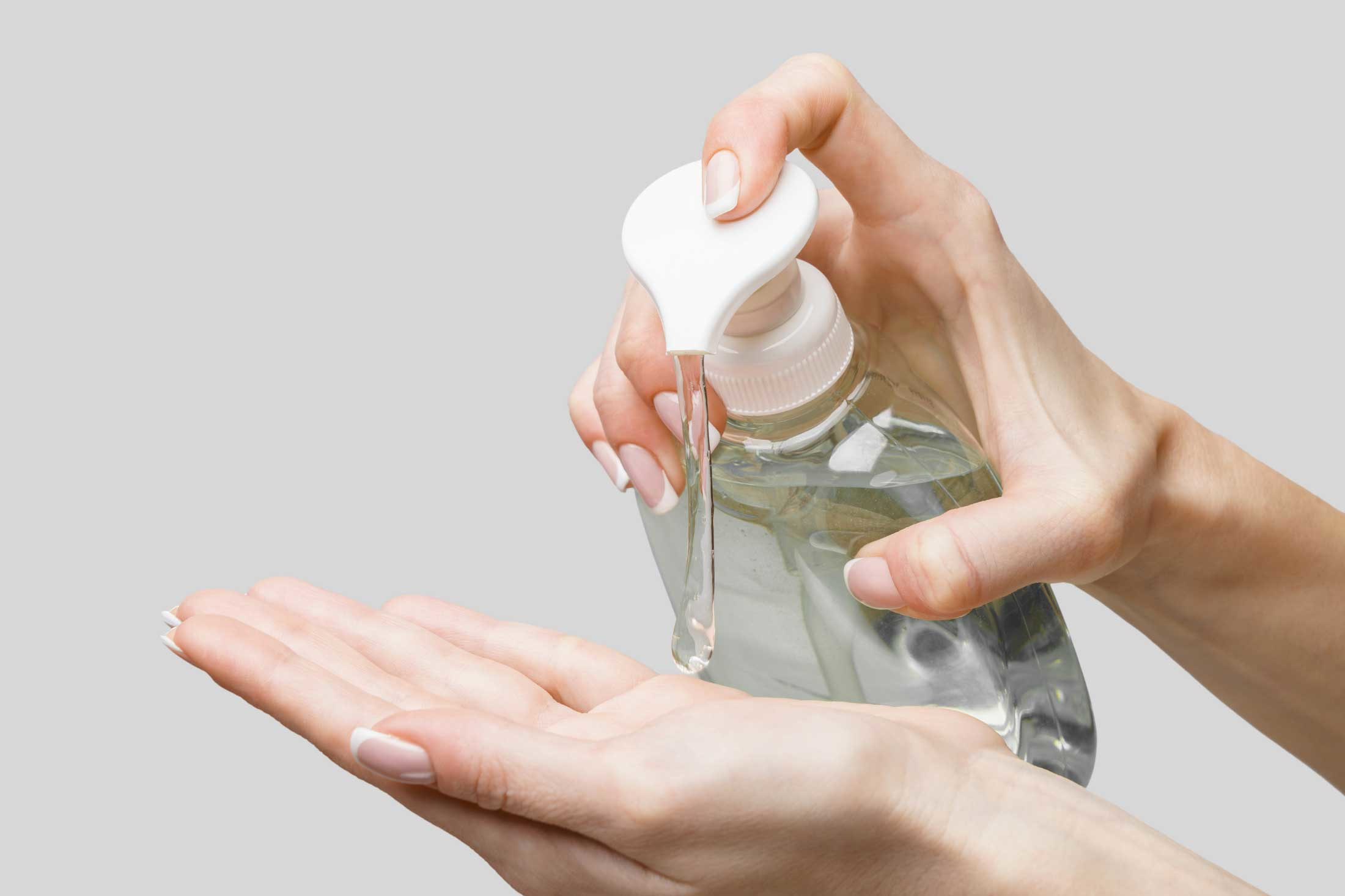 clear gel hand soap being pumped into hand