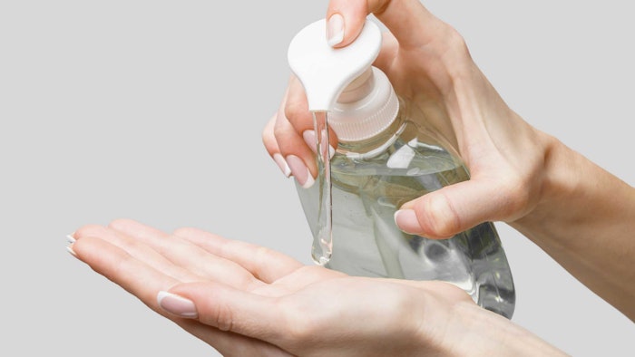 clear gel hand soap being pumped into hand