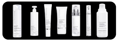 white bottles of various products in teoxane skin care line set against a black background